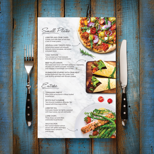 Restaurant menu card with appetizing dishes printed on high-quality paper.